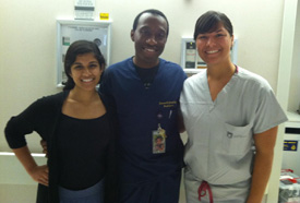 Catherine Thriveni '15 and Alyssa D'Addezio '14 with Dr. Jamandé Jones, a Pediatric Resident at the Brody School of Medicine