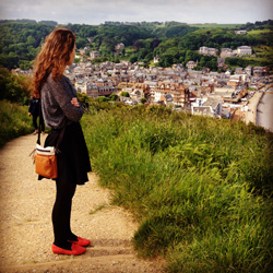 Laila Knio ’17 looking out at the cliffs that Claude Monet painted in Étretat, France – May 2014
