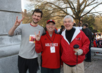 Krispy Kreme Challenge co-founder Greg Mulholland ‘07, Chancellor Randy Woodson, and Vice Chancellor for Student Affairs Tom Stafford.