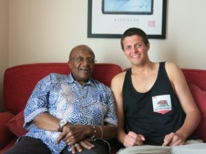 Wade Colburn with Archbishop Desmond Tutu during their time at sea.