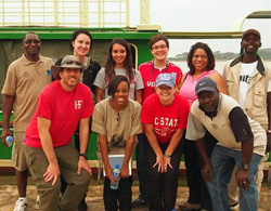 Derek Aday (front left), James Kiwanuka-Tondo (back left), and Park Scholars Maggie Miller '16 (back, third from right) and Tori Huffman '15 (front, second from right) on a trip to Uganda