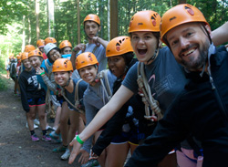 The Class of 2018 prepares for the high ropes course at their Freshman Retreat.
