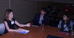 Kristin Murphy speaks with Neel Mandavilli and Rasika Rajagopalan during the Class of 2015 Leadership Academy.