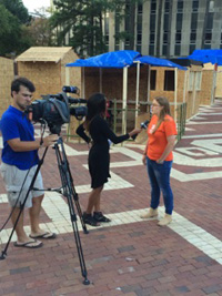 Sarah Paluskiewicz '16 being interviewed by Time Warner News about Shackathon - Fall 2014
