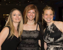 Leslie Scheunemann '01 (center) with friends and colleagues Shannon Haliko and Natalie Ernecoff at the 2014 Critical Care Medicine 50th Anniversary Gala