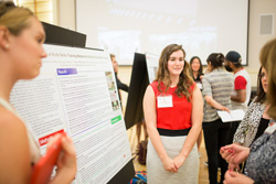 Kati Scruggs ‘18 presenting the DELTA grant-funded training video project at NC State’s Spring 2016 Undergraduate Research Symposium – Photo © Thomas Crocker