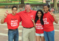 Rizwan Dard '17, DKMS' Bob Murray, Sammi Fernandes '17, and Adrienne Williams '17 during a bone marrow donor registration drive in the Brickyard – Spring 2015