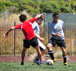 Daniel Hoag ‘03 (right) playing a game of soccer with Google co-founder Sergey Brin (left) – Photo © Hyunyoung Song