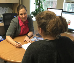 Sara Lane ‘01 works with one of her advisees in NC State’s College of Agriculture and Life Sciences.