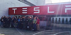 Liv Adams ‘16 (rear center) and her fellow interns during her co-op with Tesla Motors - Spring 2015